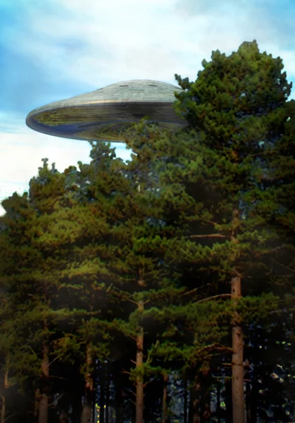 Ufo alien over a forest — Stock Photo, Image