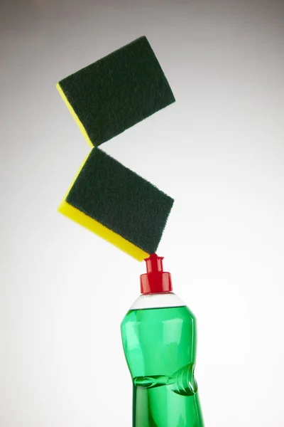 Sponge and soap bottle — Stock Photo, Image