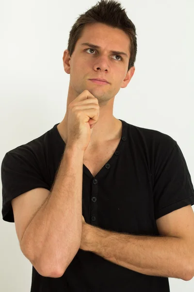 Muž myšlení s rukou na obličej — Stock fotografie