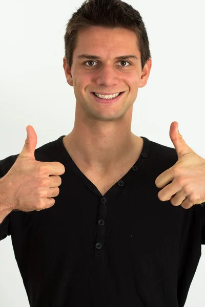Šťastný usmívající se muž dělá dva palce — Stock fotografie