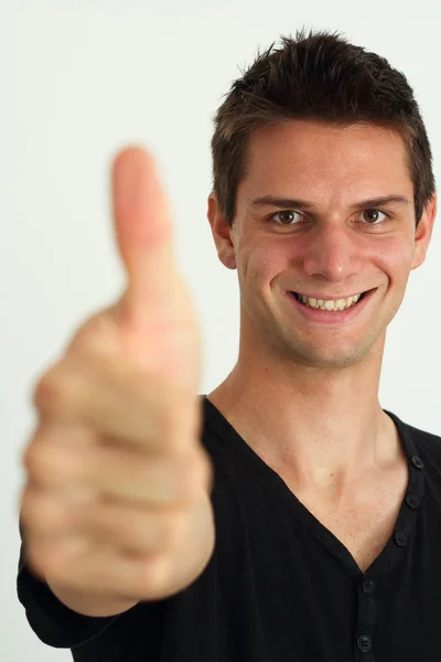 Felice uomo sorridente facendo due pollici in su — Foto Stock