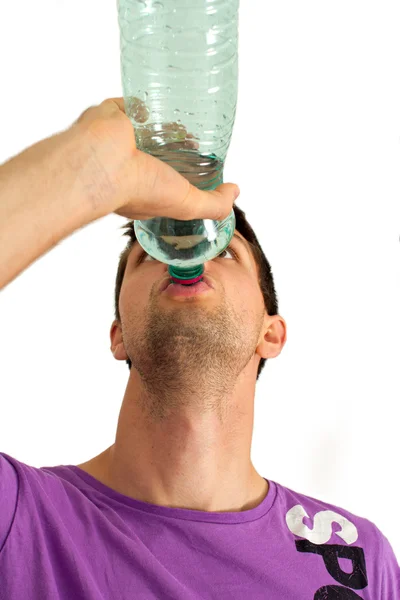 Young man drinking — Stock Photo, Image