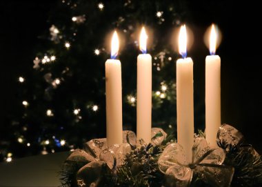 Christmas advent wreath with burning candles clipart