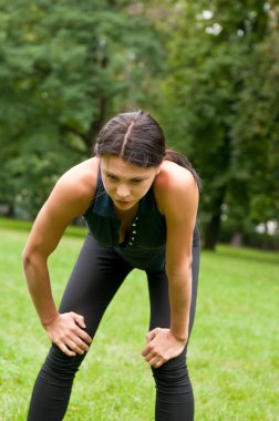 Relax - tired person after jogging clipart