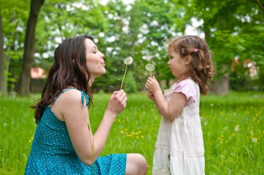 Happy life time - mother with child clipart