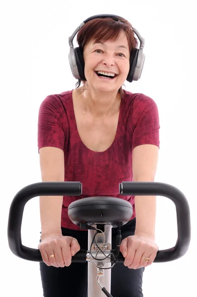 Senior spinning mulher ouvir música — Fotografia de Stock