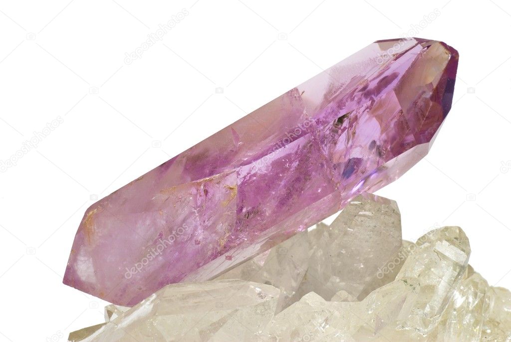 Amethyst crystal laid on quartz
