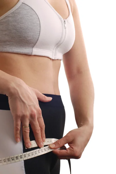 Mulher medindo detalhe da cintura - isolado — Fotografia de Stock