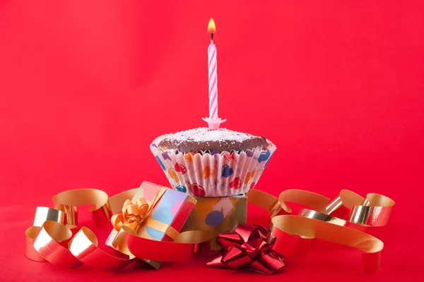 Vela de cumpleaños en un cupcake —  Fotos de Stock