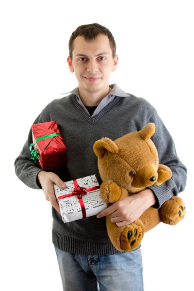 Glücklicher Mann mit Weihnachtsgeschenken — Stockfoto