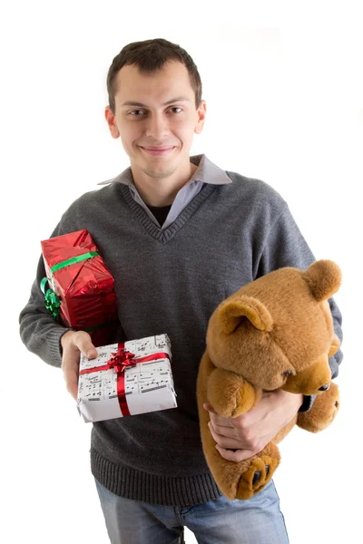 Homme heureux avec des cadeaux de Noël — Photo