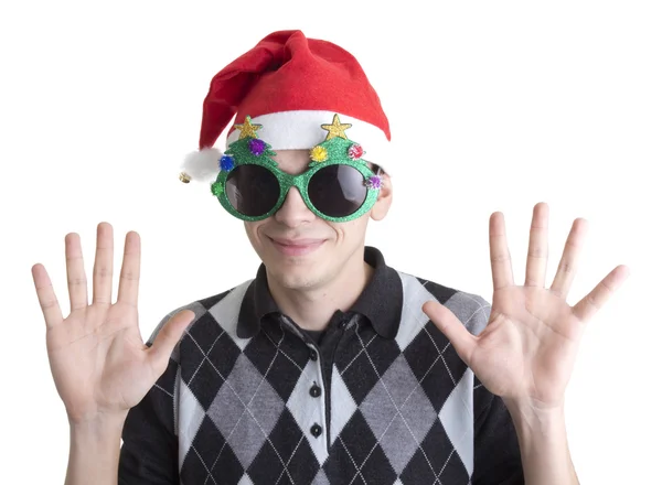 快乐的人在圣诞派对聚会眼镜和帽子举起手来 — 图库照片