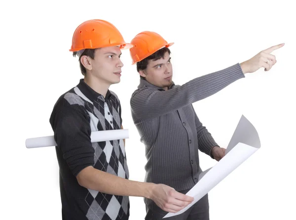 Achitects looking on a blueprints — Stock Photo, Image