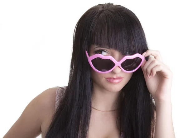 Beautiful woman in pink party glasses — Stok fotoğraf