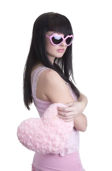 Schöne Frau in rosa Brille mit Herz — Stockfoto