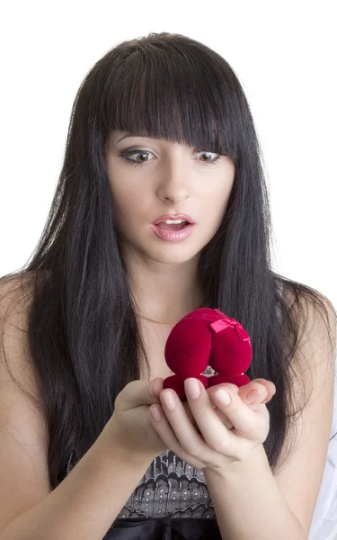 Beautiful woman with present in heart-shaped box — Stock Photo, Image