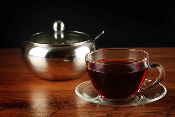 Sucre et une tasse de thé . — Photo