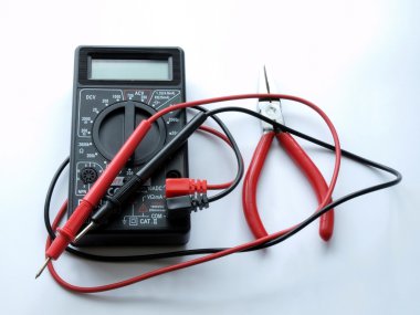 Pincers and multimeter clipart