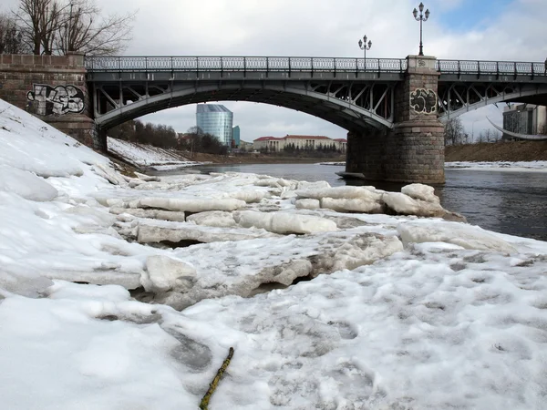 stock image The river, ice and bridge