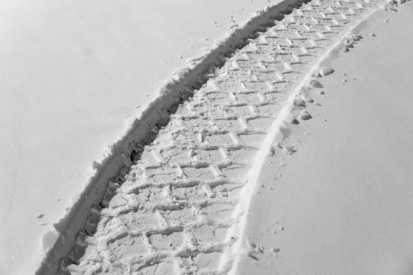Tire track in snow — Stock Photo, Image