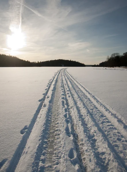 Sneeuw machine tracks — Stockfoto