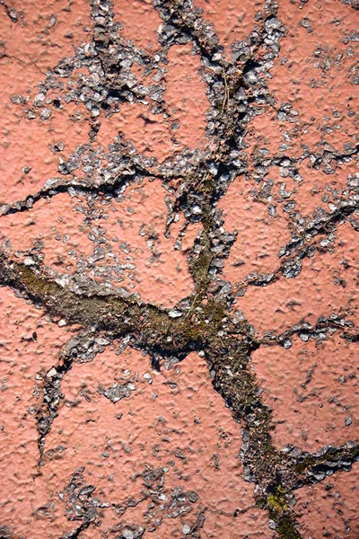 Pęknięty asfalt malowane — Zdjęcie stockowe