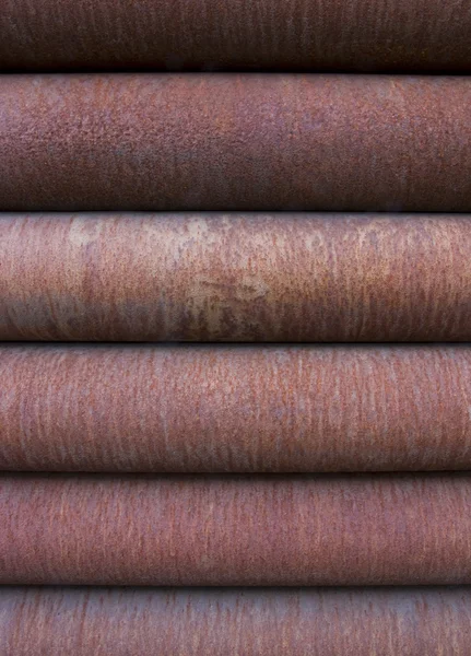 Stack of rusty steel pipes — Stock Photo, Image