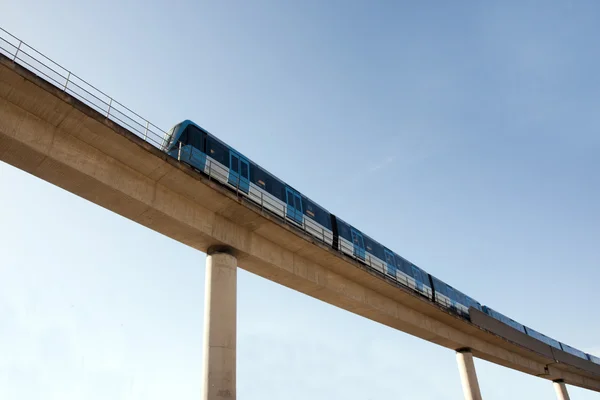 Elevated railway with train — Stock Photo, Image