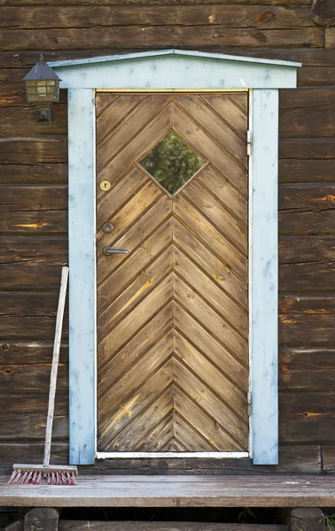 Porte de la cabane en bois rond — Photo