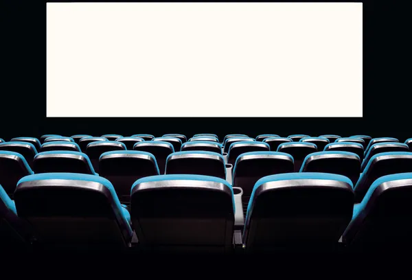 Assentos azuis vazios em um cinema — Fotografia de Stock