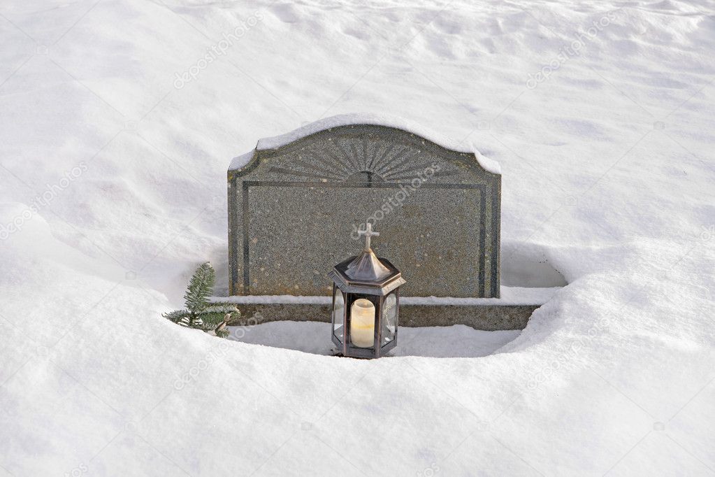 Tombstone in snow