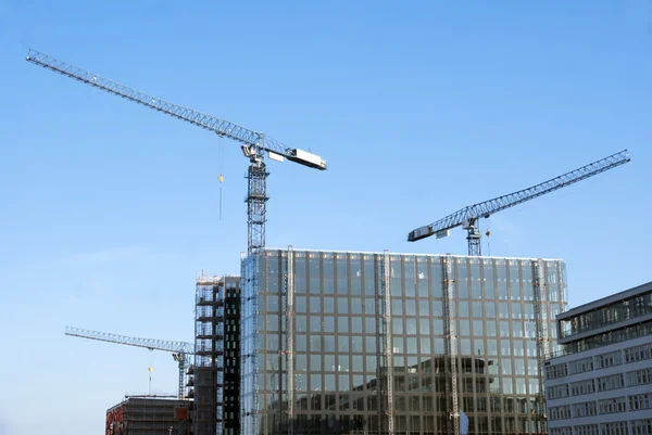 Cranes at building site — Stock Photo, Image