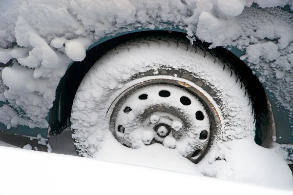 Wheel in snow — Stock Photo, Image