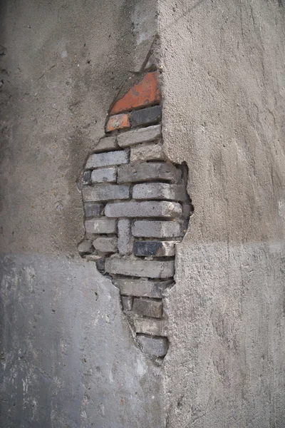 Concrete wall with bricks — Stock Photo, Image