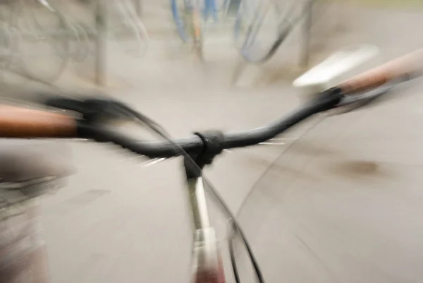 Blurred bike in rain — Stock Photo, Image