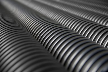 Close up of black plastic pipes clipart