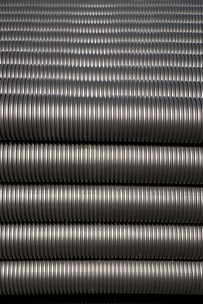 Black plastic pipes — Stock Photo, Image