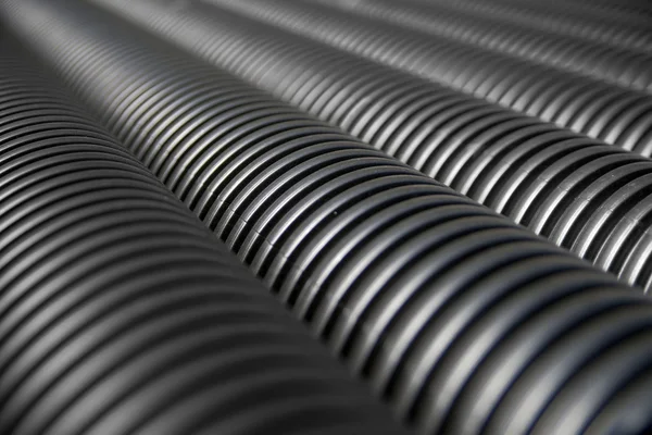 Close up of black plastic pipes — Stock Photo, Image