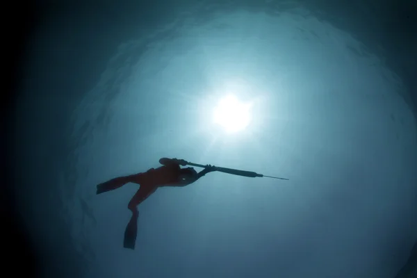 Силует підводного полювання — стокове фото
