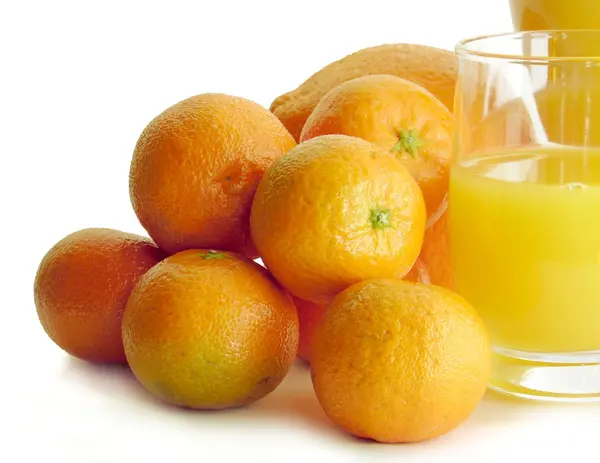 Pomeranče a šťáva — Stock fotografie