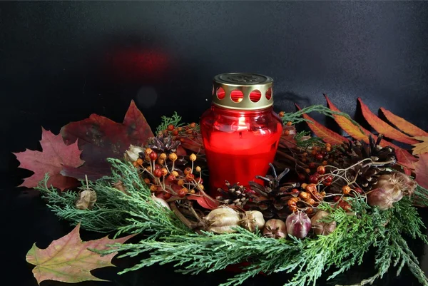 Cemetery and tomb decorated of red candle and wreath — Stock Photo, Image