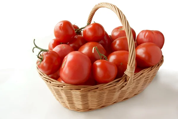 Red tomatoes in basket — Stock Photo, Image