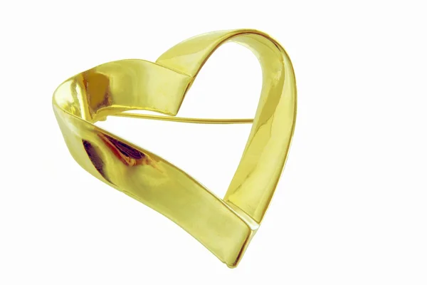 Gold heart as ornamental broche — Stock Photo, Image