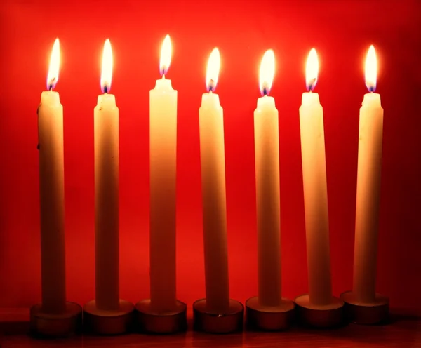 Seven burning candles as jewish symbol — Stock Photo, Image
