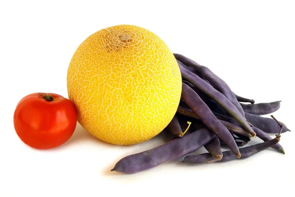 Melón dorado, legumbre lila y tomate rojo —  Fotos de Stock