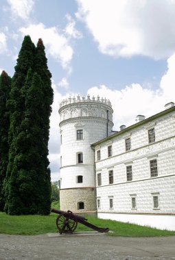 Krasiczyn castle and ancient gun clipart