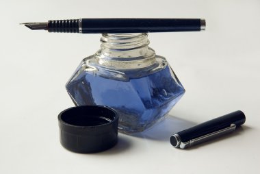Bottle of ink and fountainpen clipart