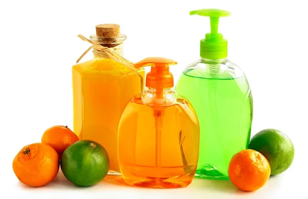 Cosmetics and citrus fruits in bathroom — Stock Photo, Image