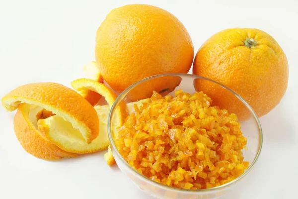 Pele laranja e frutas — Fotografia de Stock