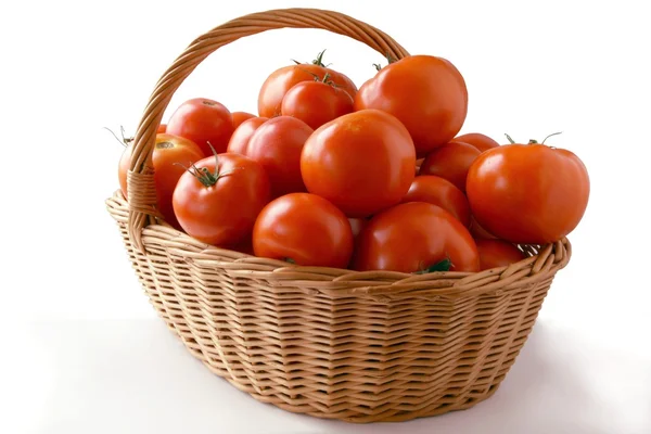 Red tomatoes in basket — Stock Photo, Image